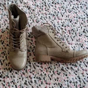 Light grey colored leather boots